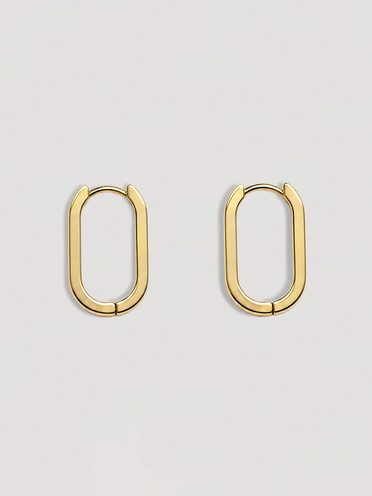 ELONGATED GOLD HOOP EARRINGS